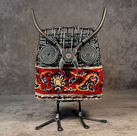 Looming lapis Owl